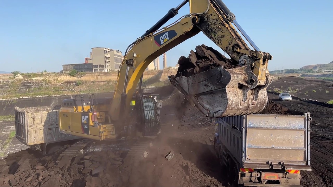 Caterpillar 352F Excavator Loading Coal On 4 Axle Trucks - Ascon Ltd