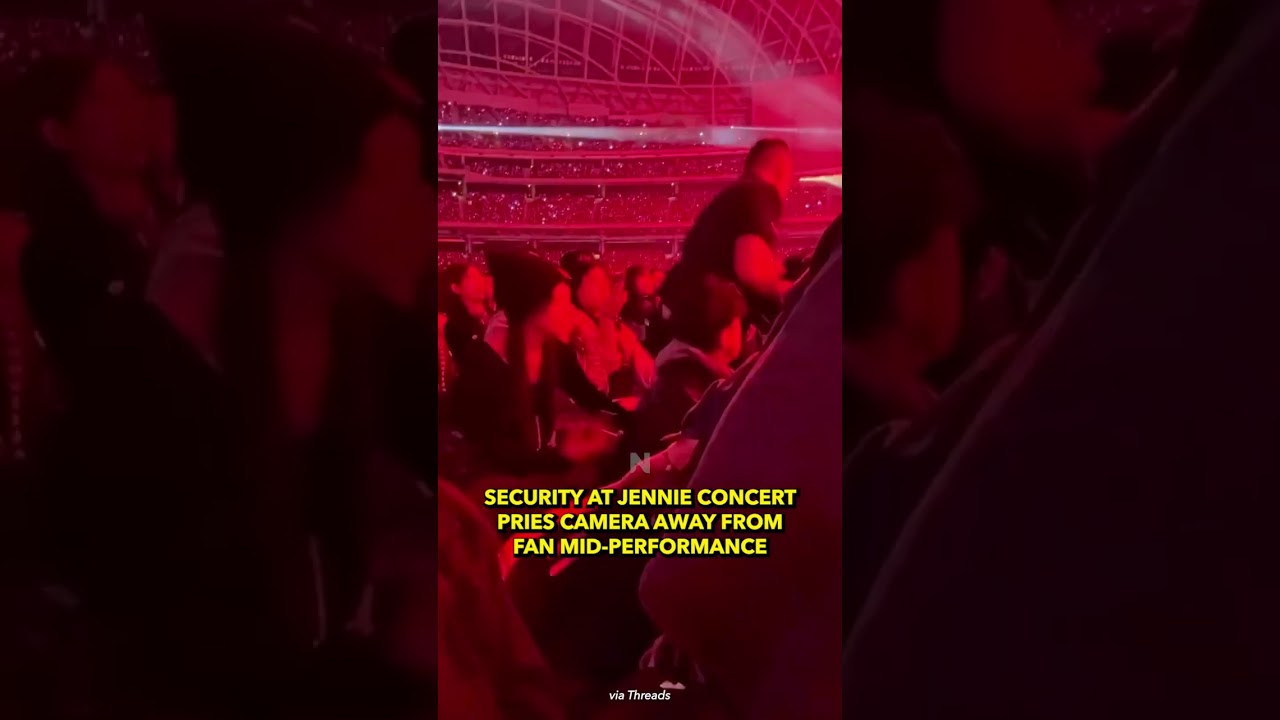 Security at Jennie's Concert Pries Away a Camera from a Fan