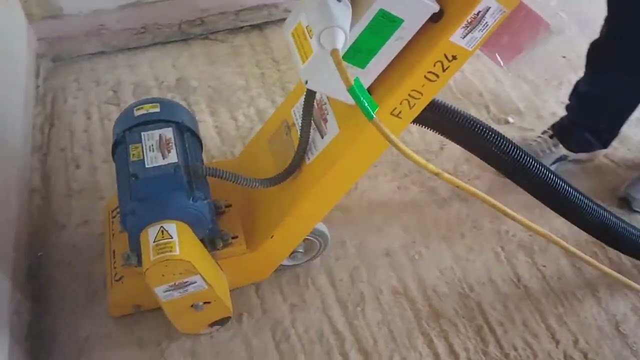 Bef200 110v floor plane scabbler fitted with tct cutters in domestic taking down a few mm screed