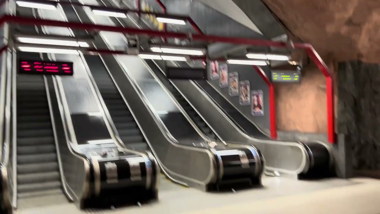 Stockholm - Sundbybergs Centrum. 3x O&K escalator from platforms to street. Pt1
