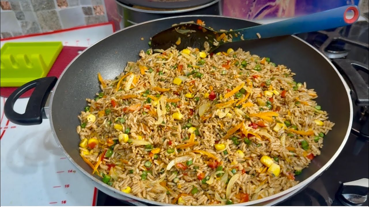My delicious fried rice with lemon chicken #cooking #uk #deliciousfood #guyanese cooking 