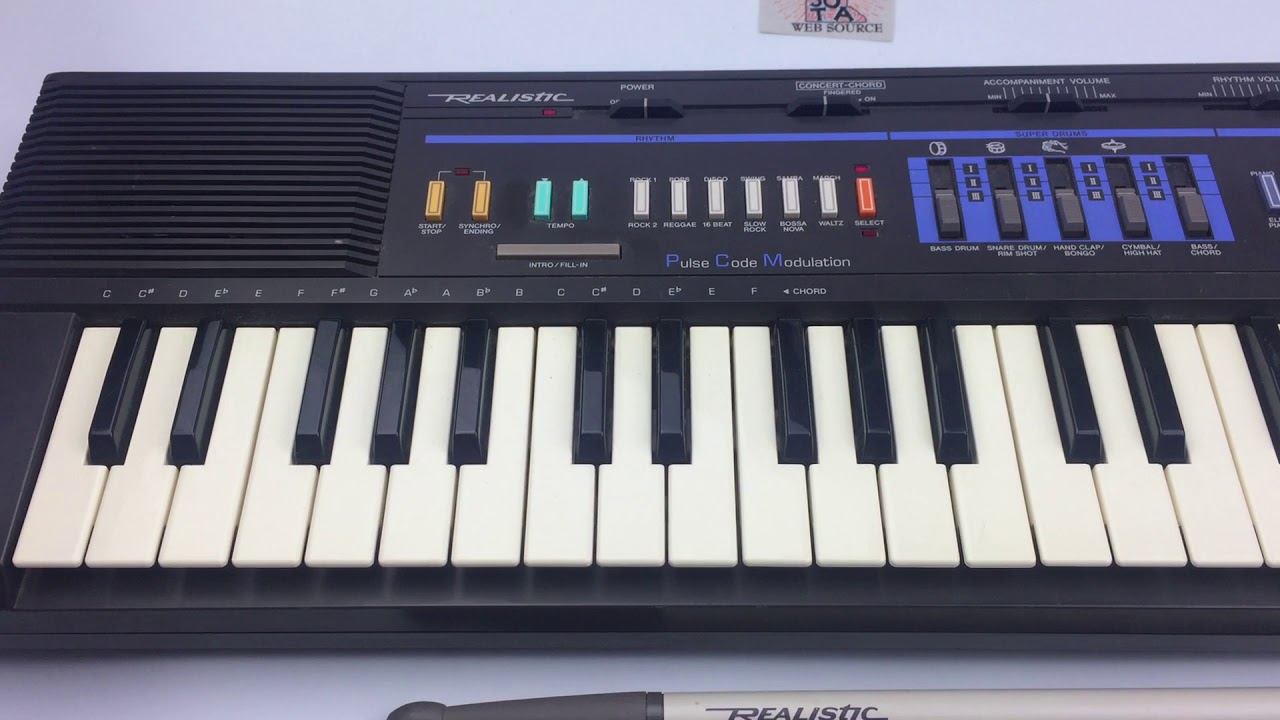 Realistic Concertmate 700 Electronic Keyboard with Drumsticks