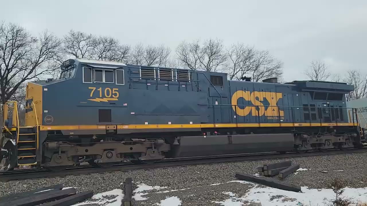 EB CSX manifest train with mid dpu in Ogden Dunes 