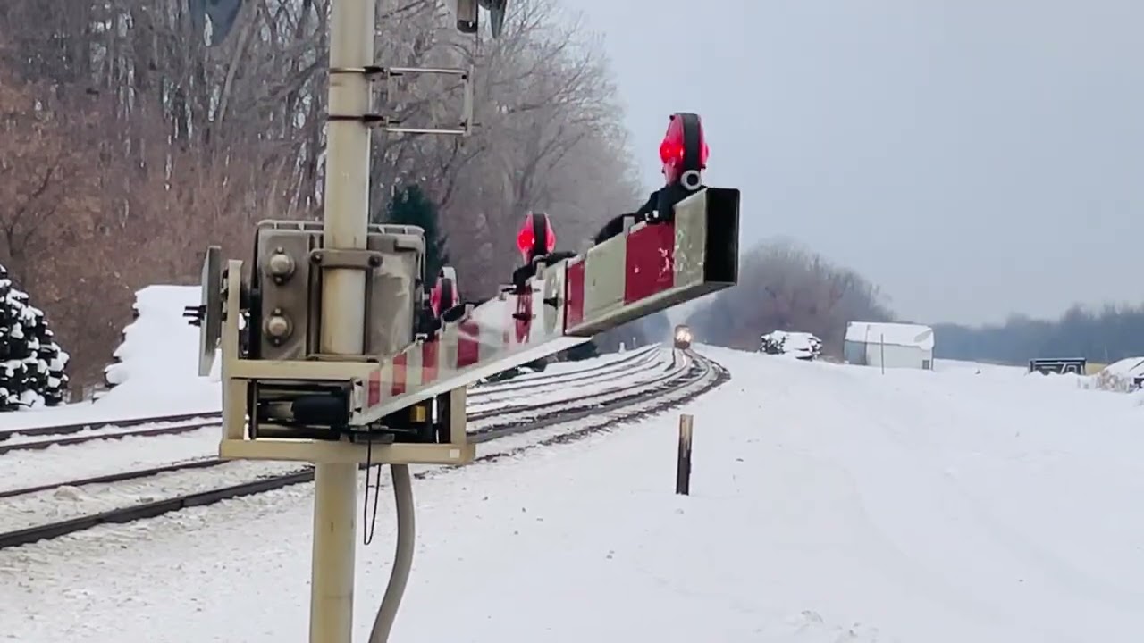 Amtrak lake shore limited crossing pottery with a horn show led by 90
