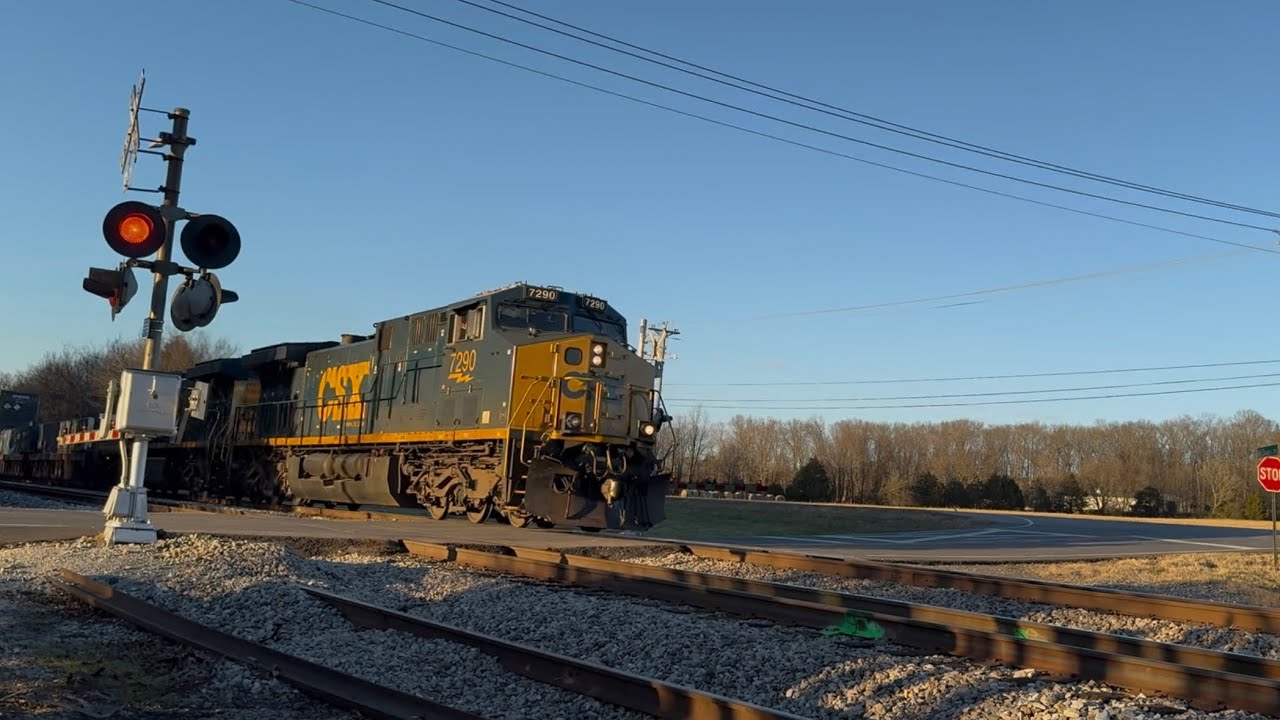CSX 7290 leads an intermodal/autorack  train with a friendly crew!