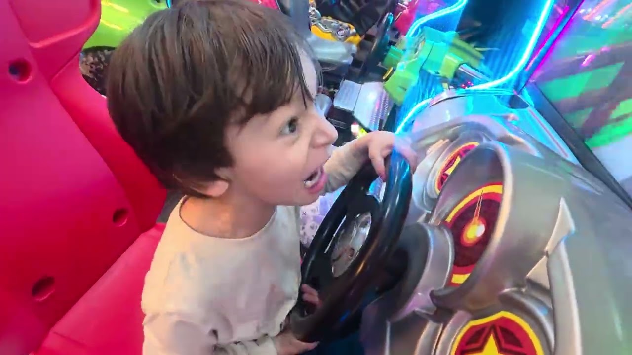 Mario Cart arcade Alexander and Ethan at Peter Piper Pizza
