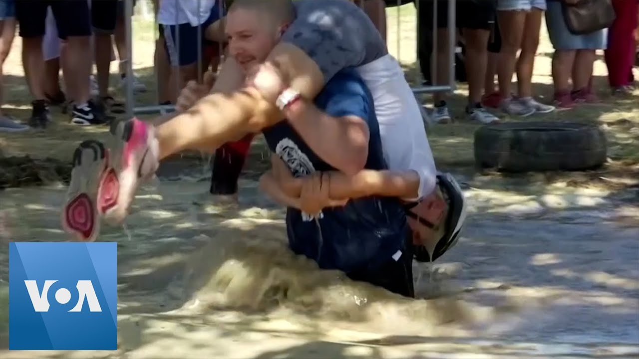 Hungarians Participate in Wife-Carrying Race