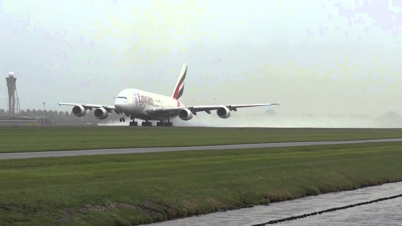 A380 Emirates  A6-EDG wet full power takeoff with lots of spray from AMS Schiphol