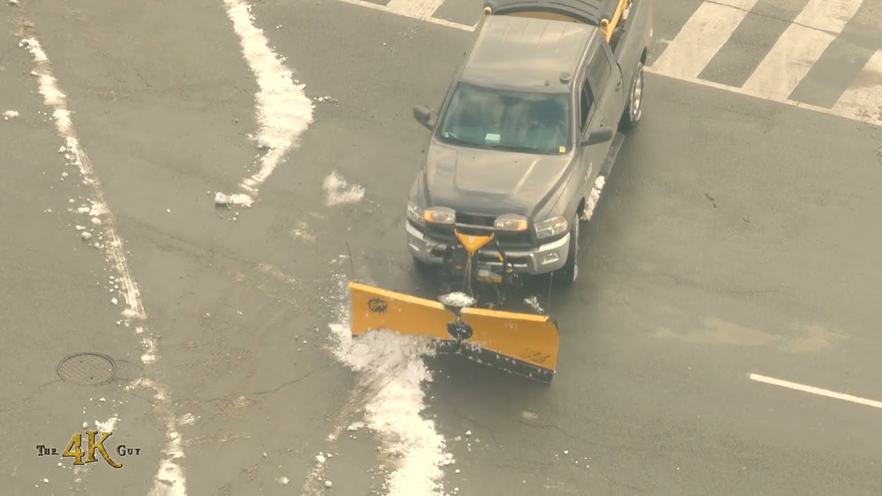 Snowplow Video 72 - Multi vehicle types clearing snow from city