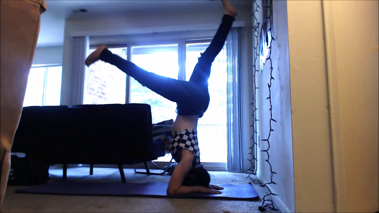 Frontbender's 1st  attempt  at teaching herself the scorpion pose