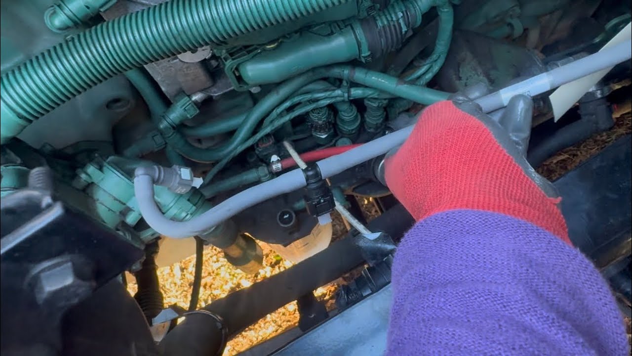 DIY how to replace fuel hose or air vent pipe part 24345123 on a 2019 Volvo VNL D13 engine.