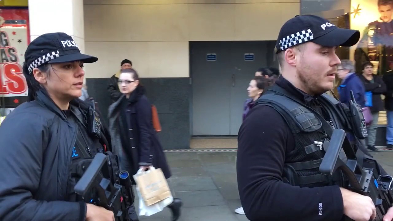Armed police officers patrol Nottingham city centre