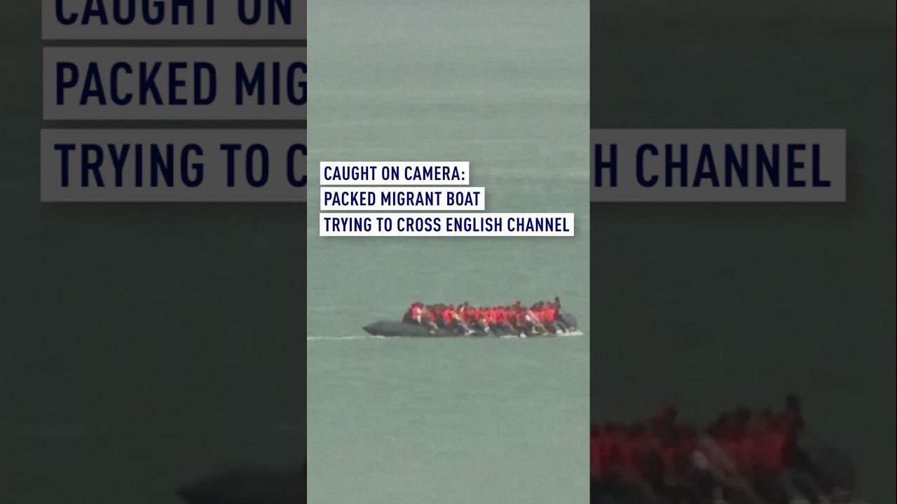 Packed migrant boat caught on video trying to cross English Channel