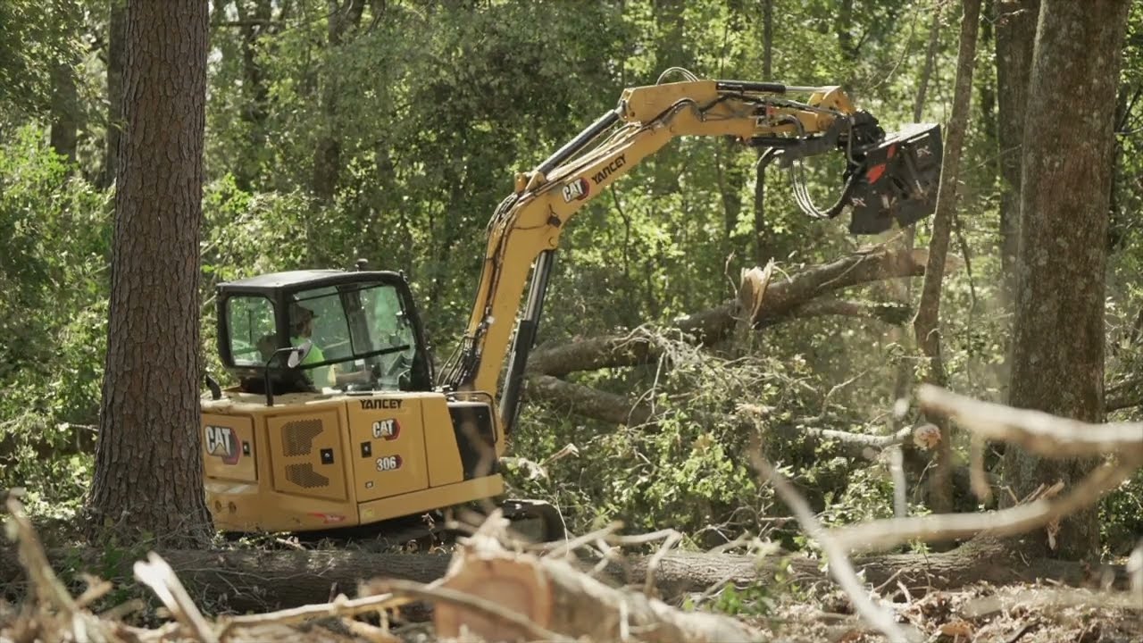 CAT 306 Excavator with Shearex VM25-SK mulching fallen trees