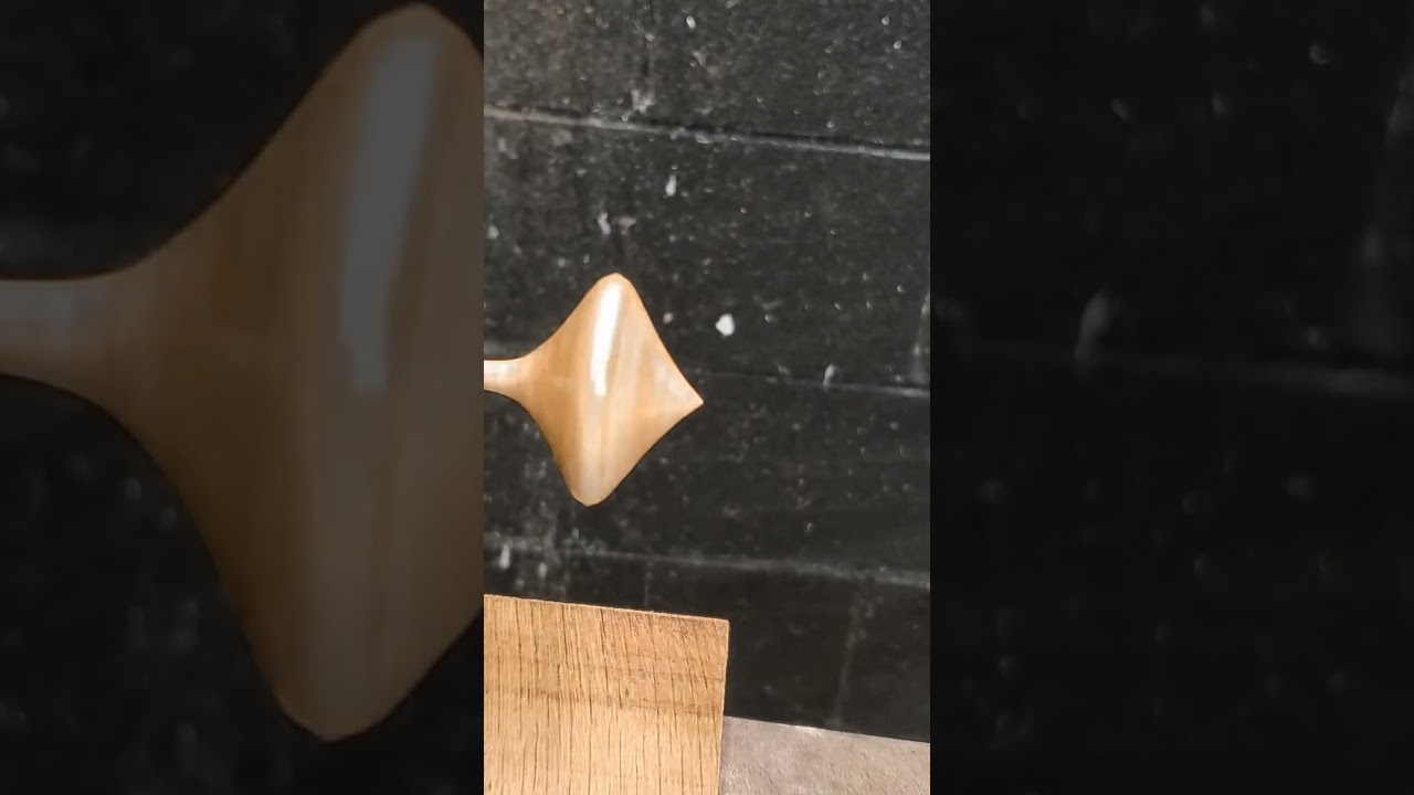 So Shiny! 😃😗Simple CA Glue finish makes this top spin faster! #shorts #woodturning