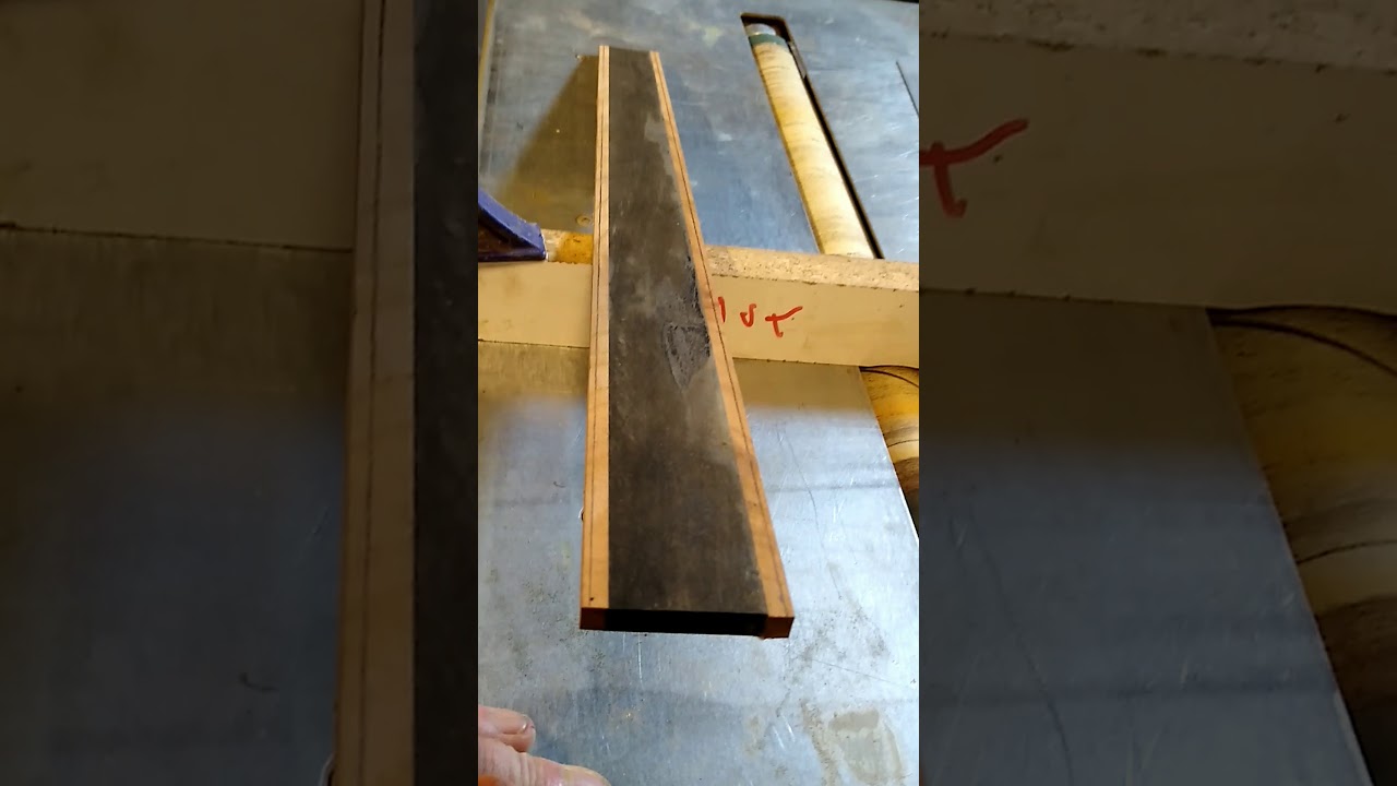 Sanding binding to the proper thickness on a fret board. Part eight