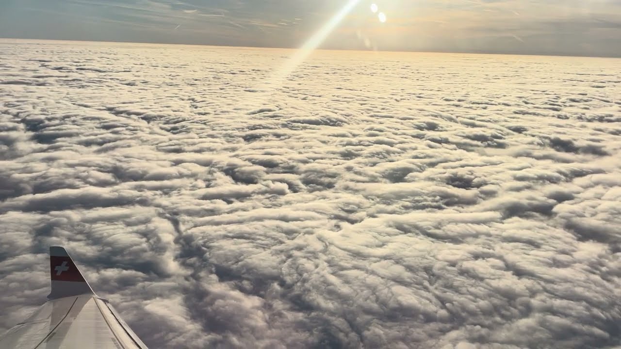 Cloudy Landing at Copenhagen - Swiss - Airbus A220-100 - ZRH to CPH