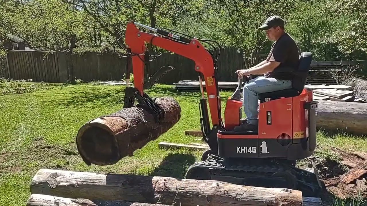 Gardner's Groundhog Mini Excavator with Log Grabber