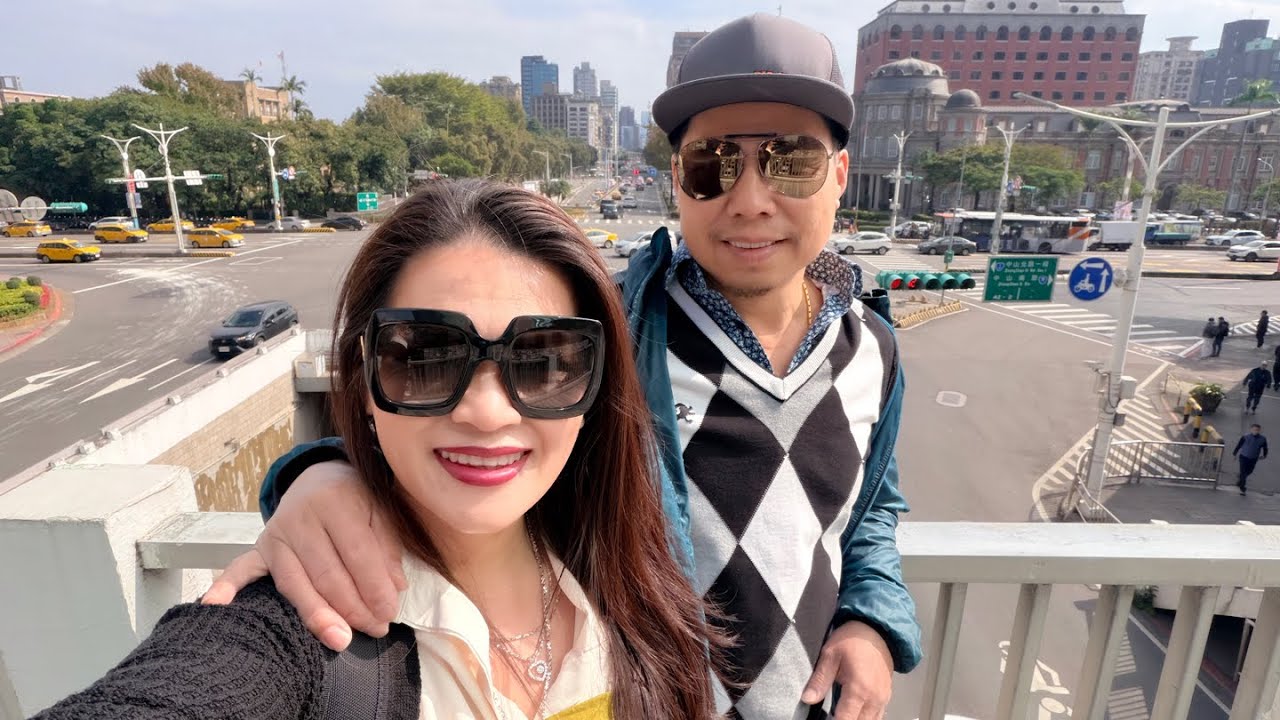 Taking stroll to Taipei main station to meet up with our tour group