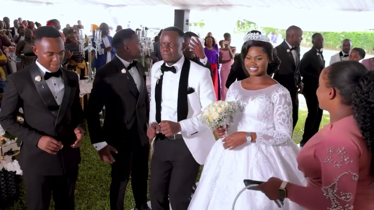 AMOS&VIOLA WEDDING RECEPTION ENTRANCE woowww ( PRAISE GOD )