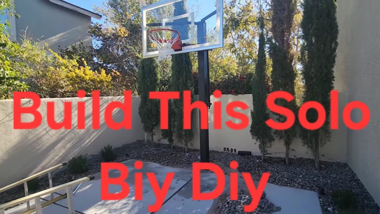 How to build a in ground basketball hoop solo.