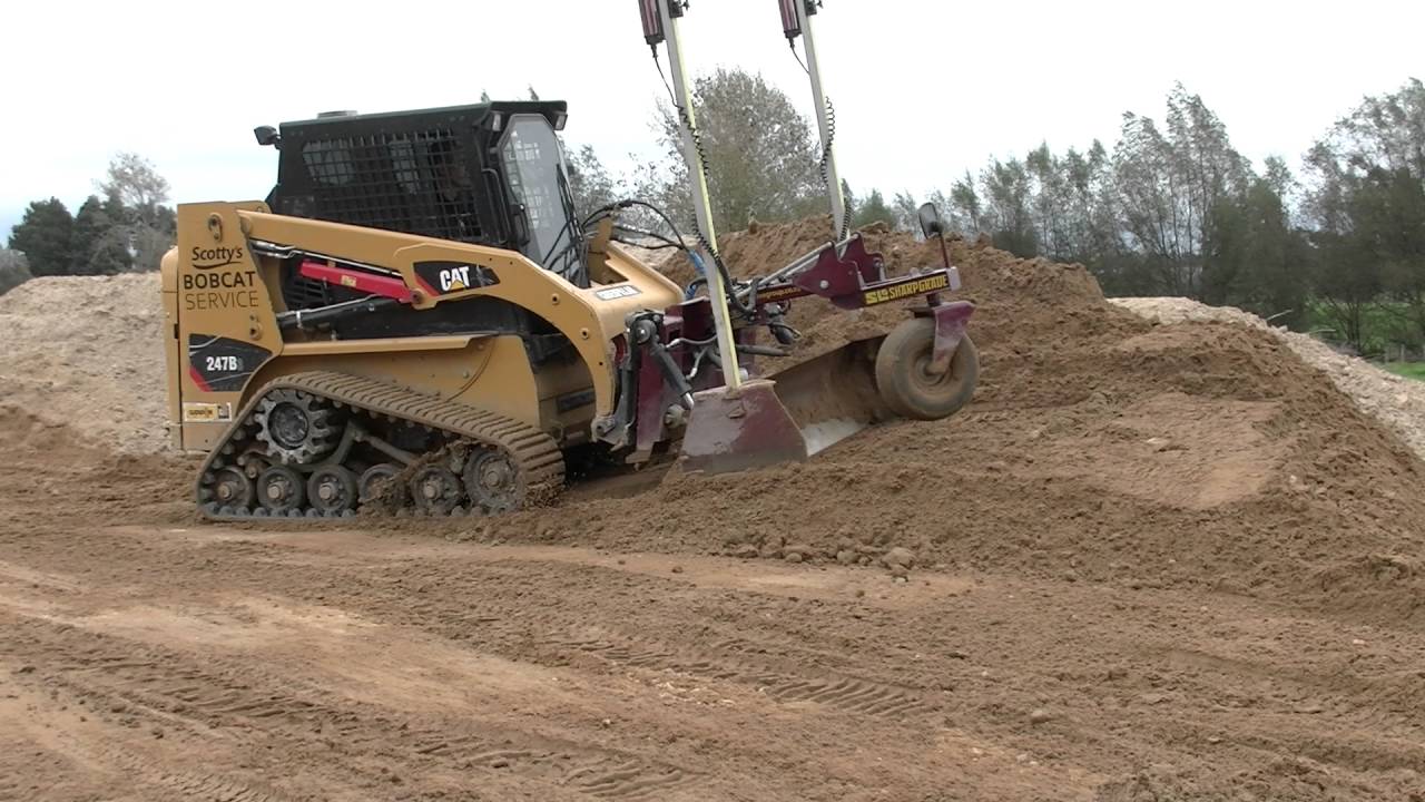 Cat 247B3 SharpGrade 1 8 DGR laser grader with ExTraks