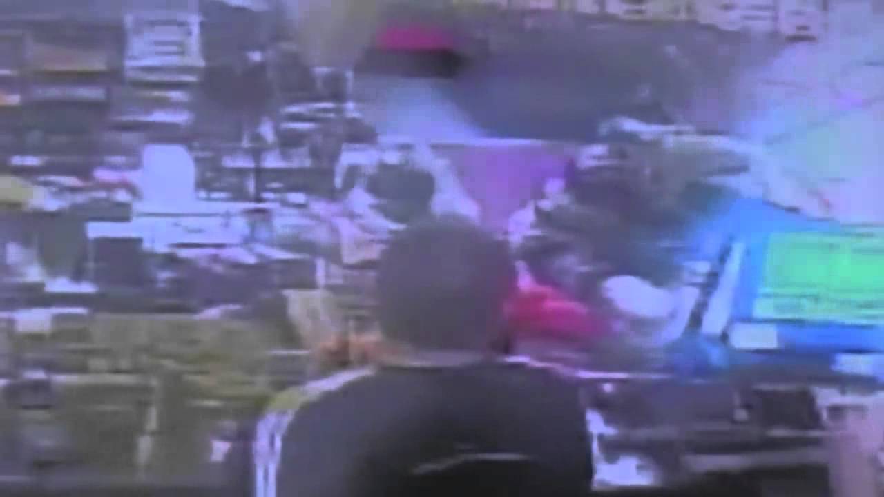 Gas station employee strikes back with beer bottle against armed robber