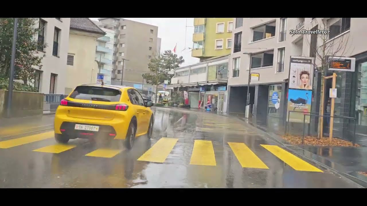 Driving in Switzerland. Beautiful Town Neuhausen am Rheinfall Beautiful Town Rainy Weather Drive