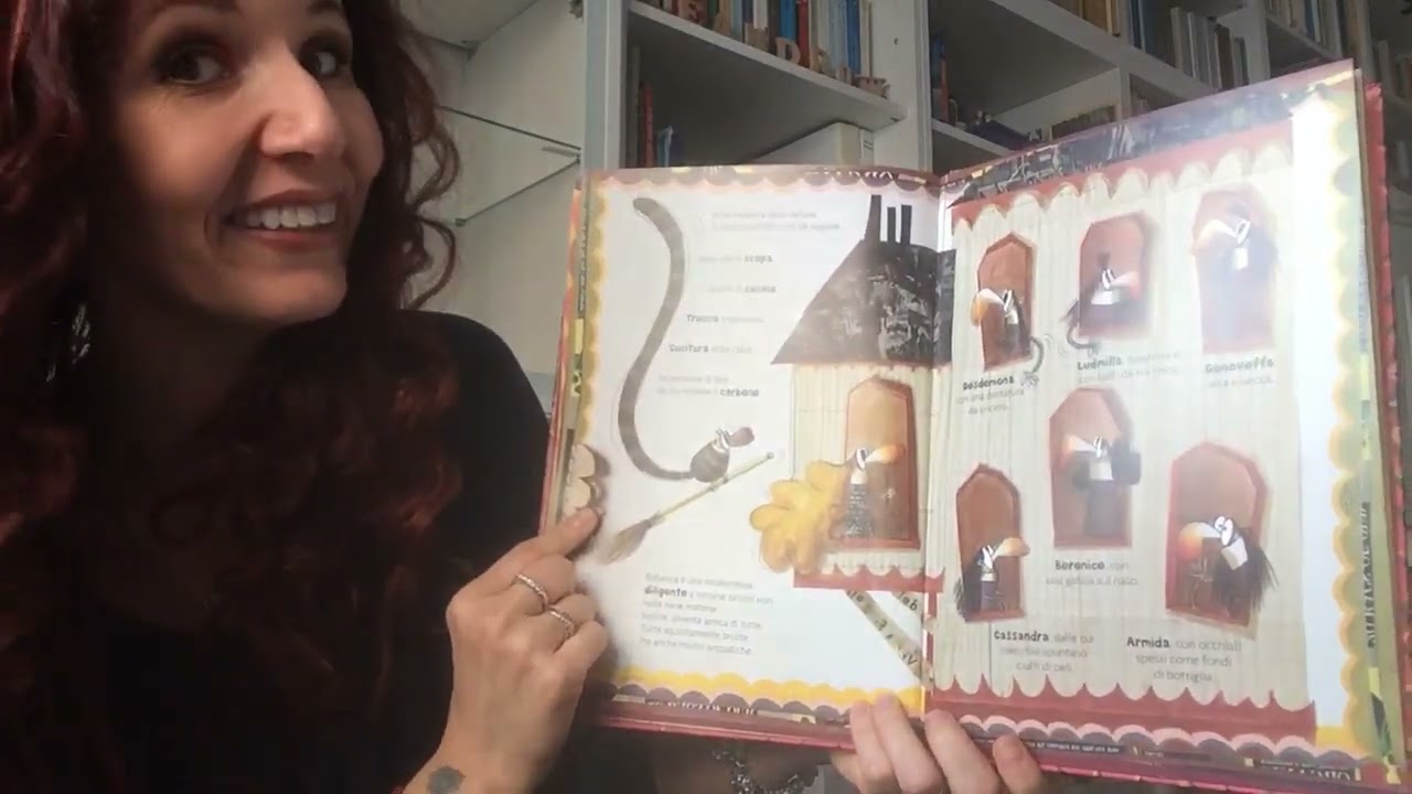 Elena legge L’accademia delle befane, di f. Degl’innocenti e a. Cantone, edito ARKA