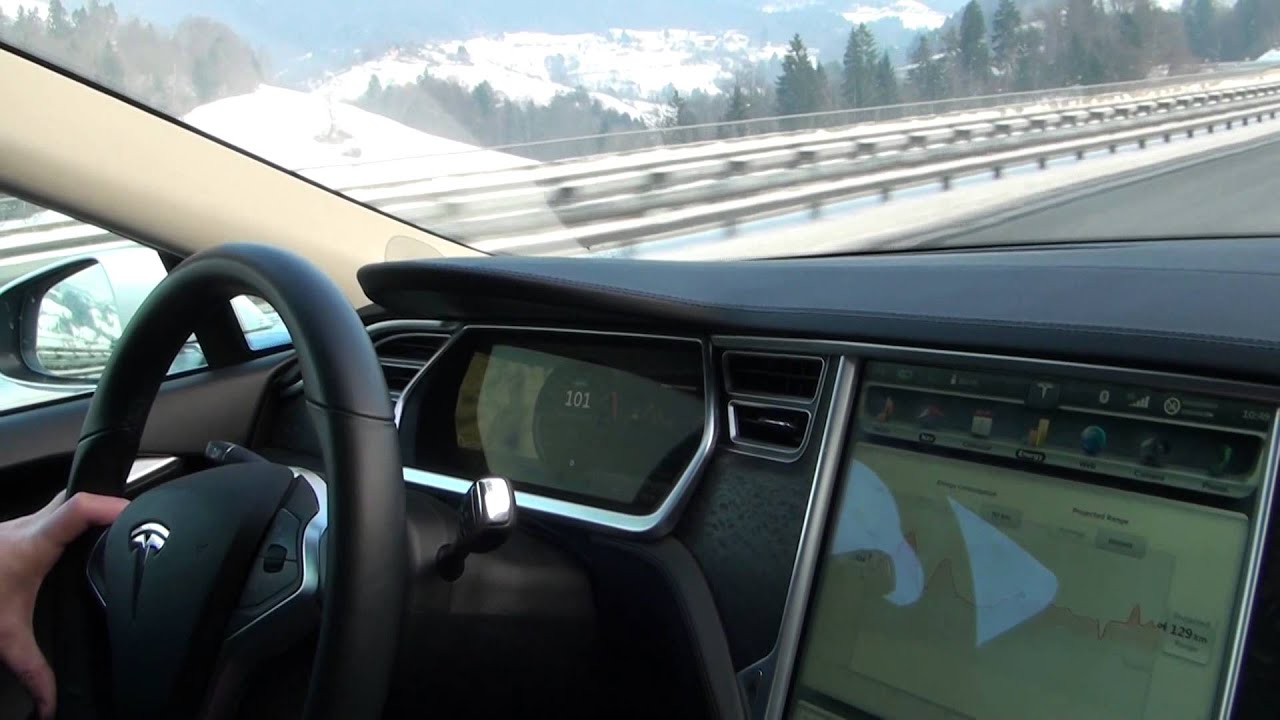 Tesla Model S winter test driving on highway
