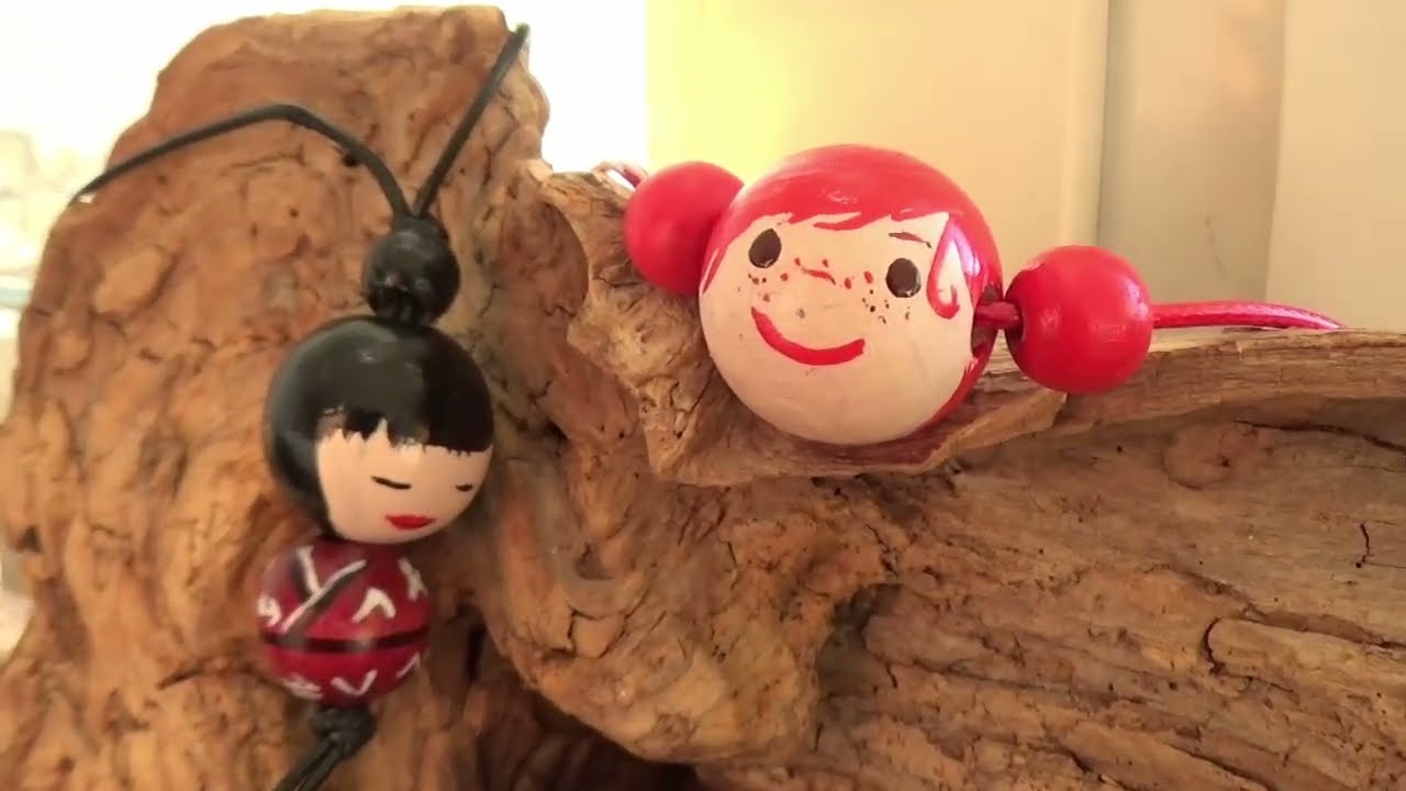 Wooden doll pendants