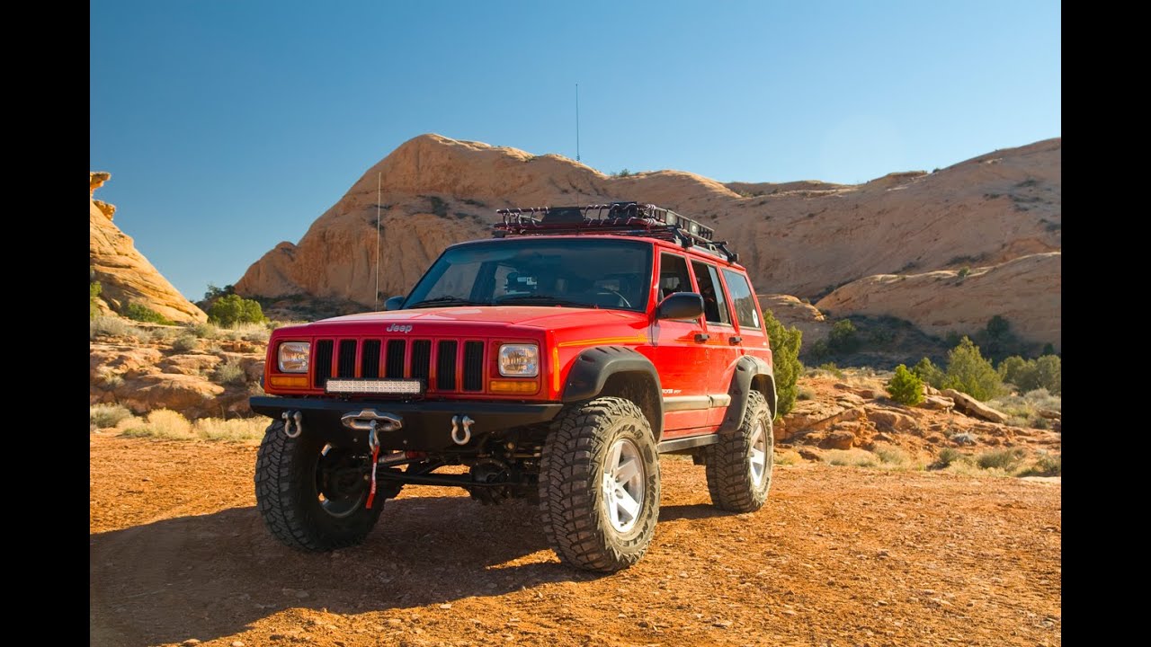 Jeep Cherokee (XJ) Moab, Utah.  Fins and Things Trail and not so happy wife.