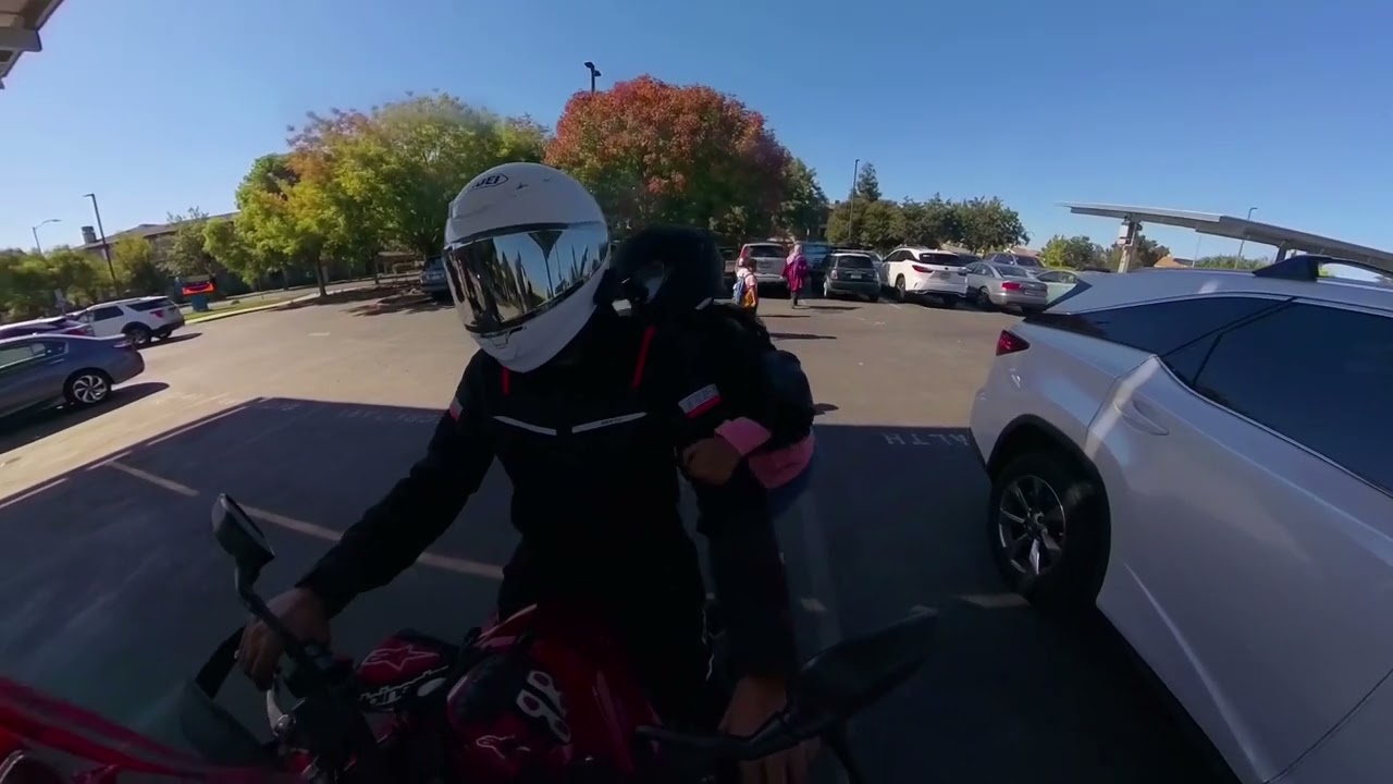 Picking up Daughter from School on motorcycle