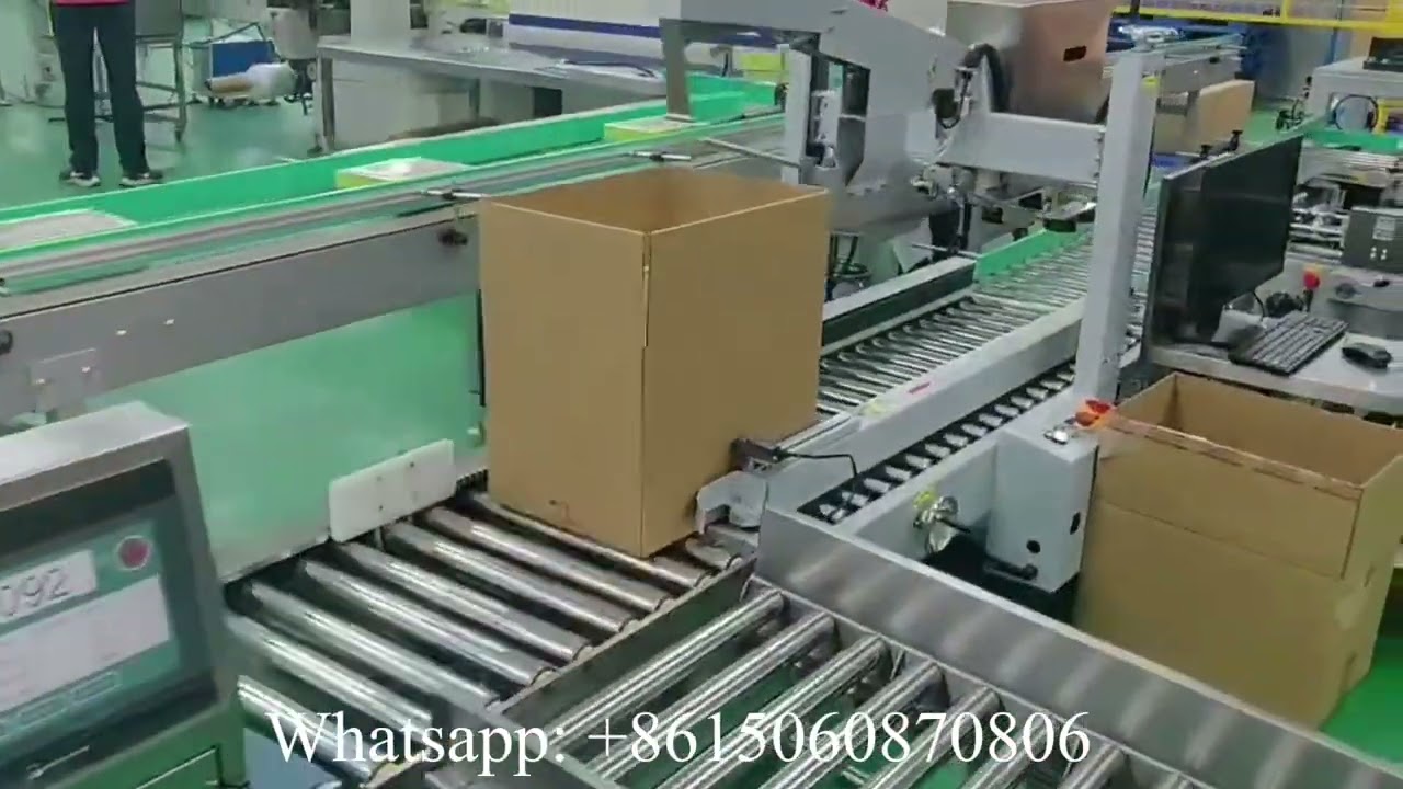 Automatic carton box wrapping machine
