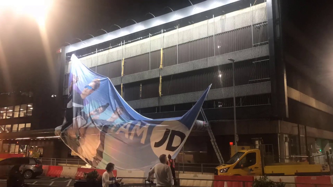 Manchester Airport T3 Building Banner Change Over Ad Campaign