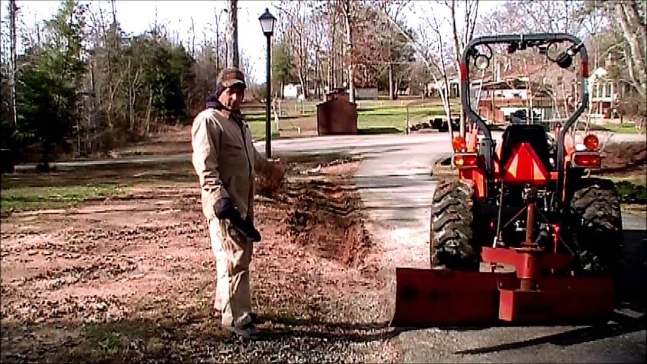 How to use the road blade to cut a ditch line