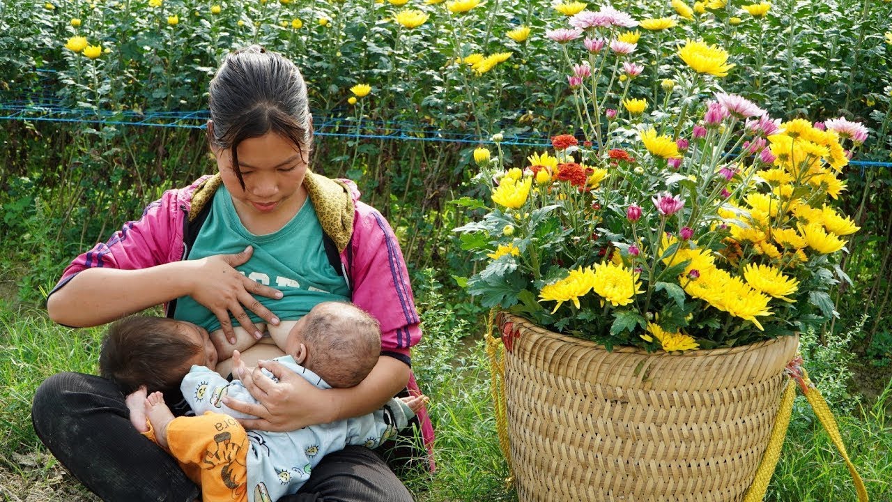 Single mother and two children go to pick flowers to sell at the market