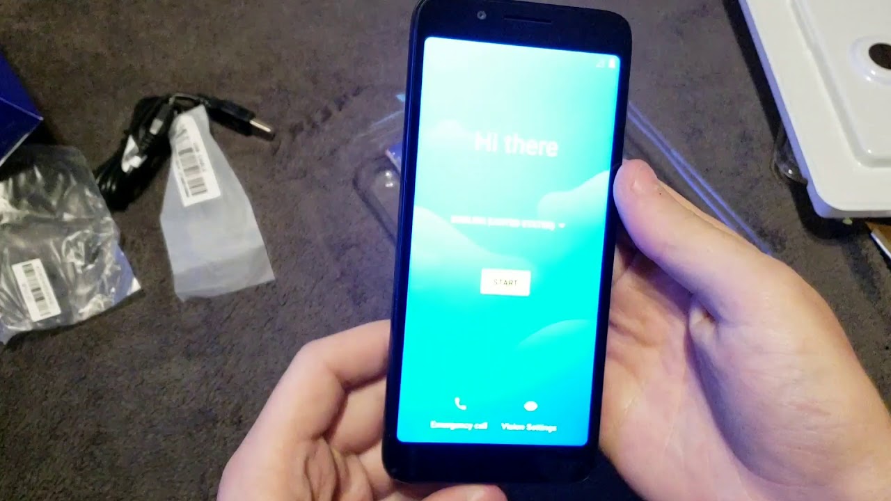 Распаковка и обзор смартфона за $30 (TCL LX)
