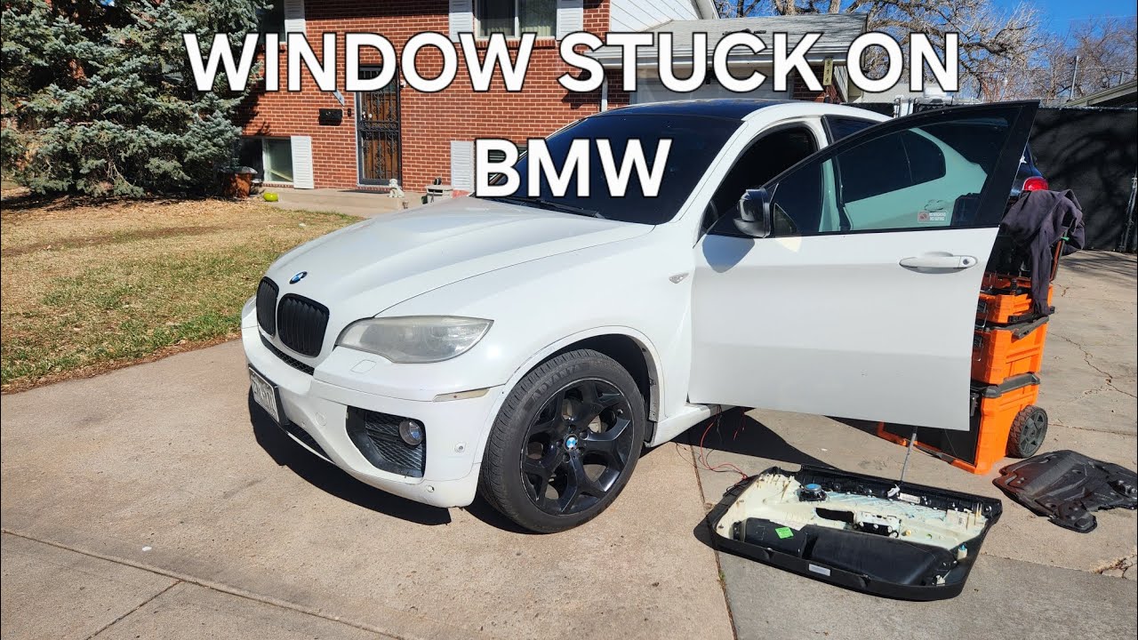 Решение проблемы застревания стеклоподъемника в автомобиле BMW X6 2013 года выпуска (возможно, ег...