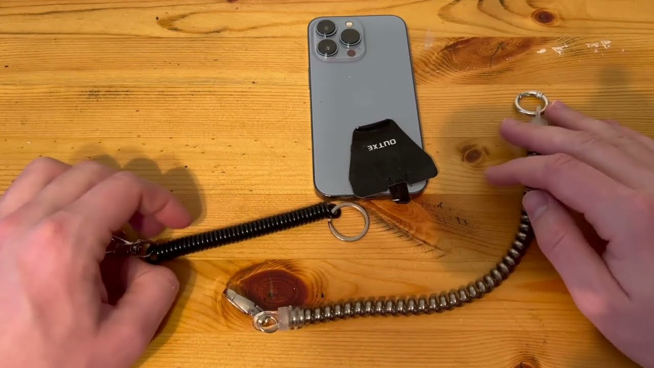 Phone Tethers Compared HOTEMIA Phone Tether Lanyard Anti Theft Phone Strap vs  OUTXE