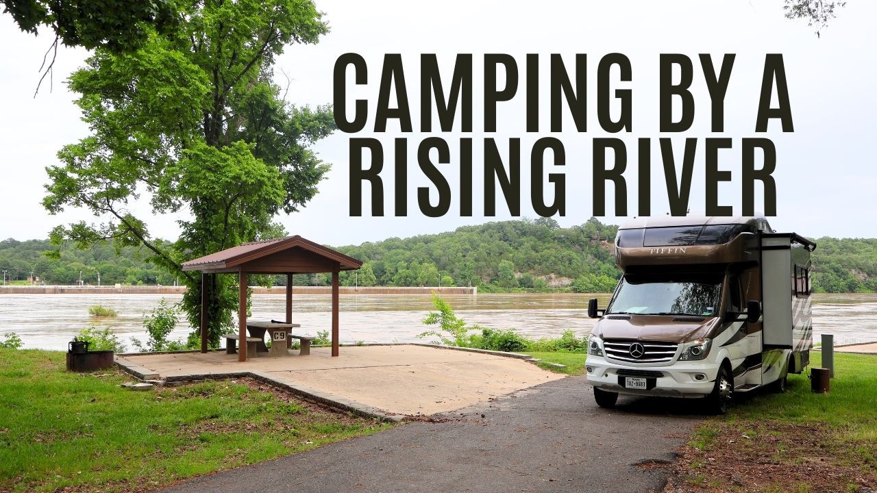 Camping in the rain near a river- Arkansas river at flood stage