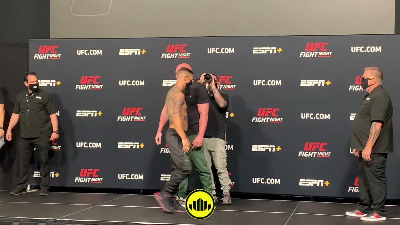Ion Cutelaba pushes Dustin Jacoby at weigh ins
