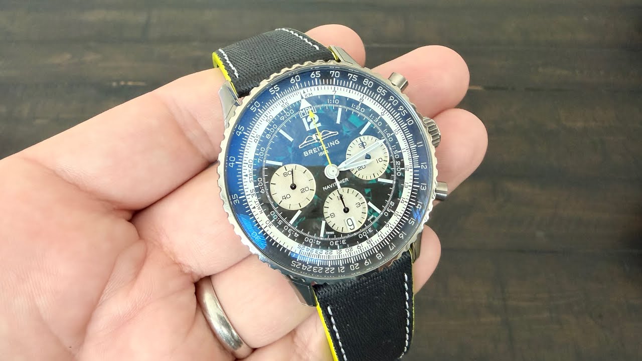 Распаковка Breitling Navitimer B01 Chronograph 43 Aston Martin F1 Edition (EB01381A1B1X1)