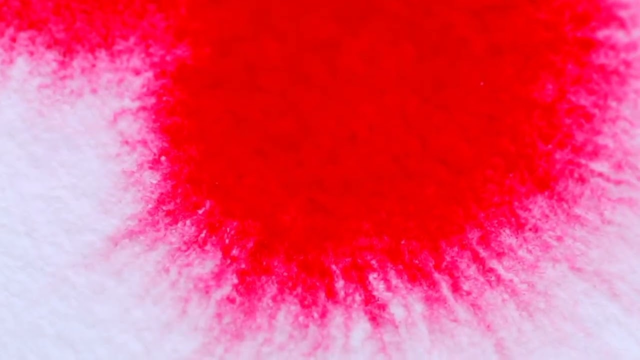 Splattering Red ink on Parchment Paper with Water HD | By Creator Stockify
