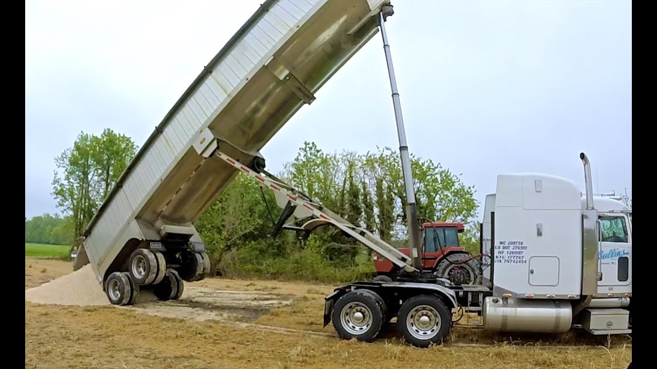 Dumping 24 ton of Lime to spread on Corn Fields