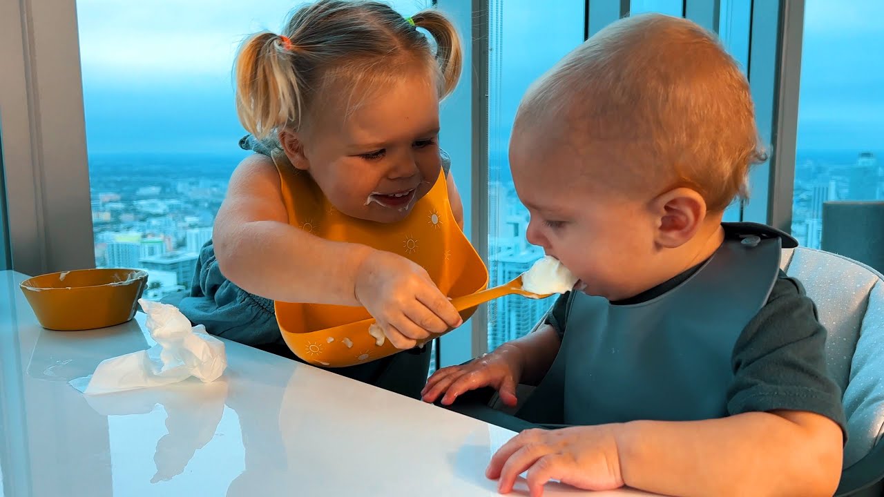 How older toddler takes care of her younger brother