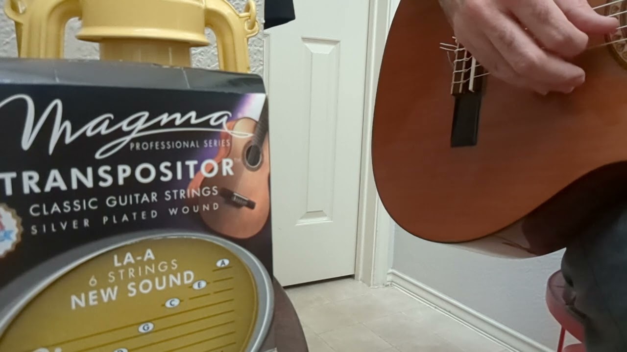 Magma Transpositor Classical Guitar Strings tuned low A (bass clef) on Calido CG 1450 with koa
