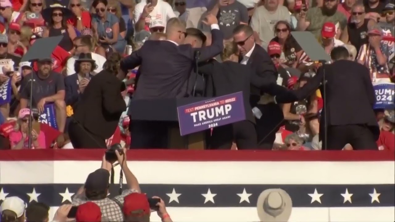 Raw Video: Donald Trump whisked off stage during rally in Pennsylvania after loud noises ring out