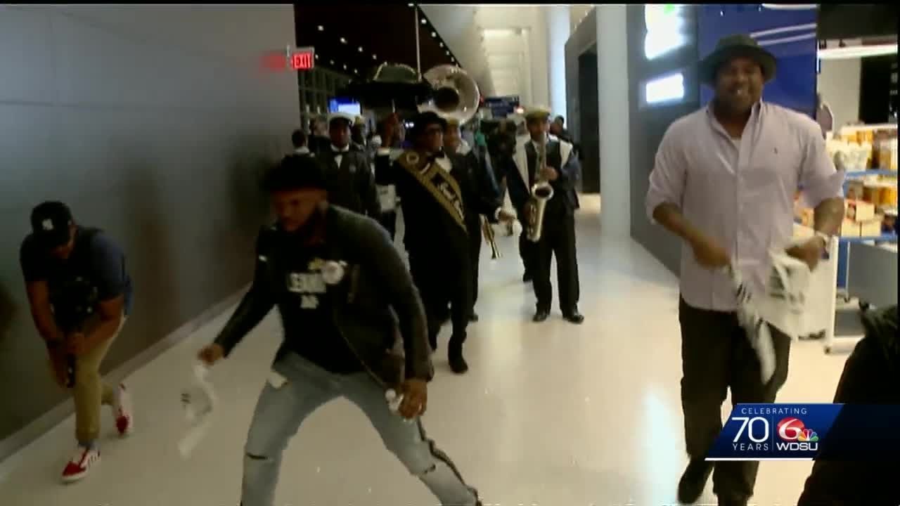 Secondline sends off passengers on first flight from new MSY terminal