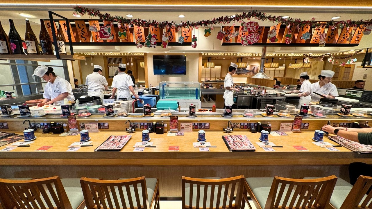 Eating Conveyor Belt Japanese Sushi and Sukiyaki Hotpot